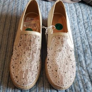 White platform slip on shoes